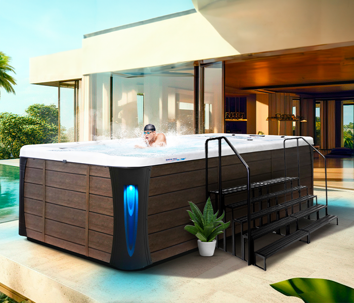 Calspas hot tub being used in a family setting - Plantation